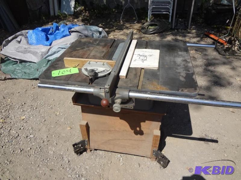 lot 104 image: Delta Table Saw...