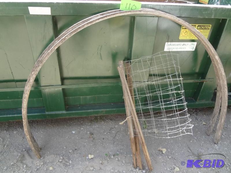 lot 110 image: Two Laminated Wood Half Hoops, fence on stake...