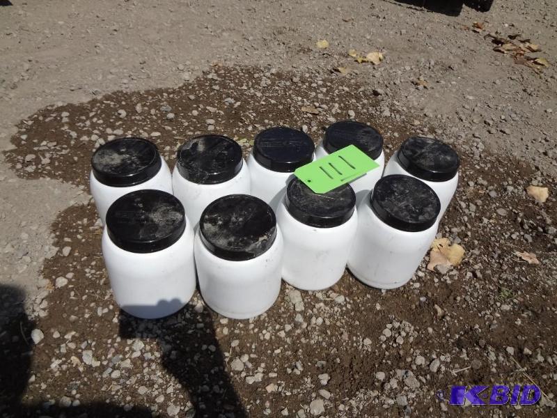lot 111 image: Nine Containers of Golf Balls...