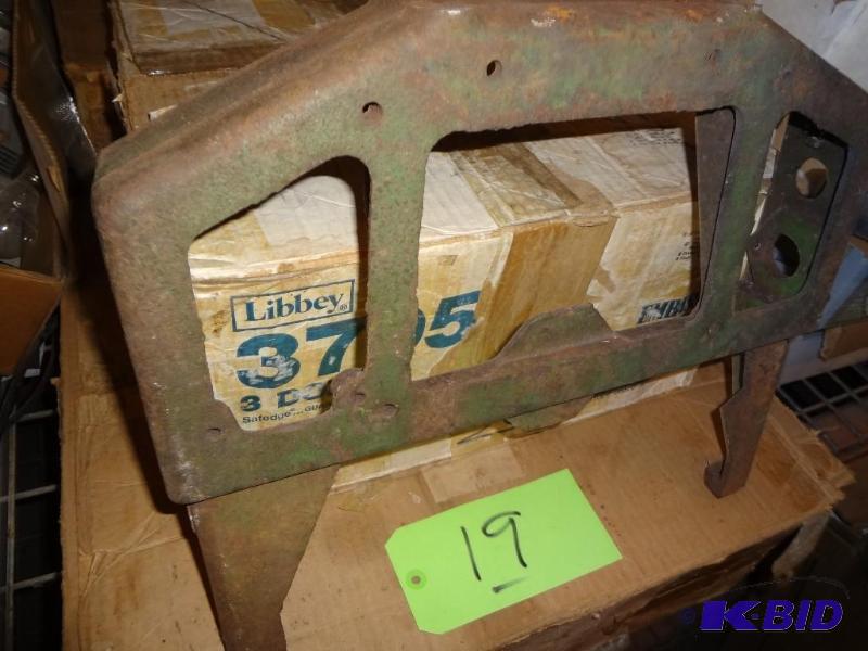 lot 19 image: Old John Deere Cast Nose Ring...