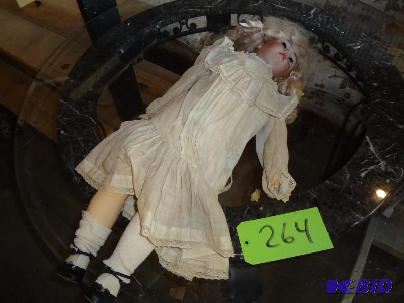 lot 264 image: Old German Bisque Doll, eyes inside head, nee...