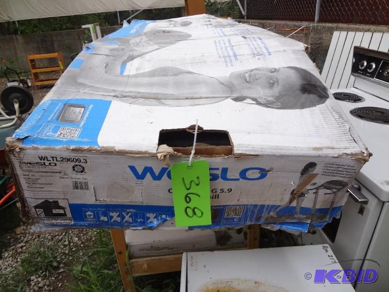lot 368 image: Weslo Treadmill, New in Box but box looks bad...