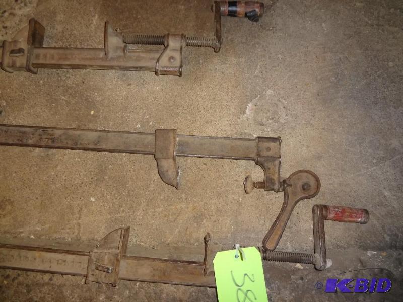 lot 384 image: 3 Large old wood clamps, 6ft long approx....