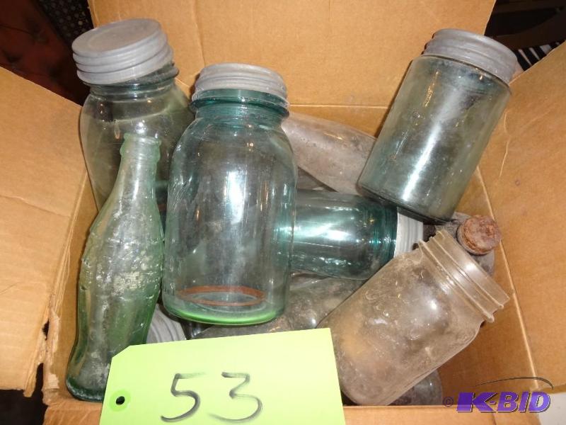 lot 53 image: Old Blue Glass Jars...