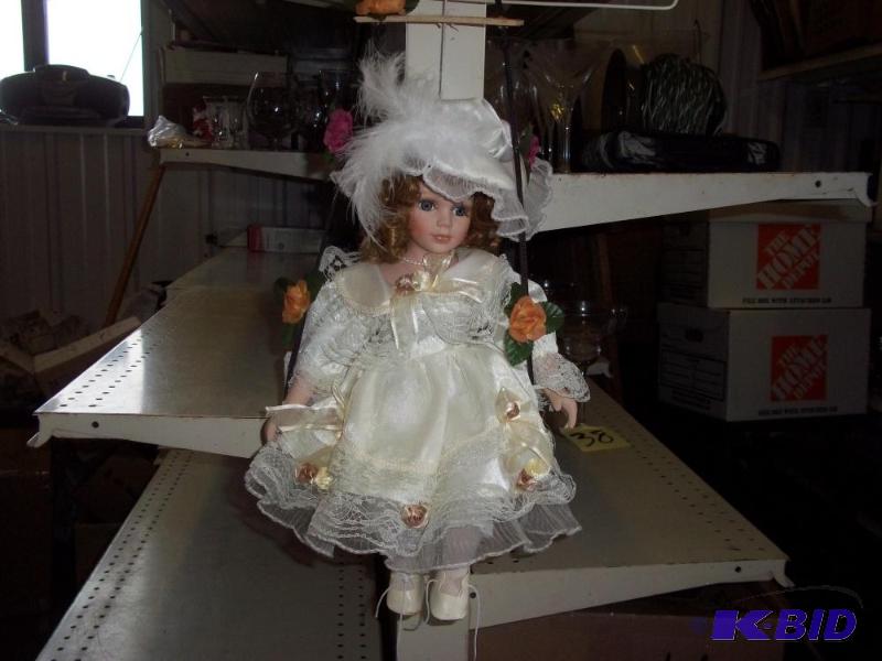 lot 113 image: Porcelain Doll...