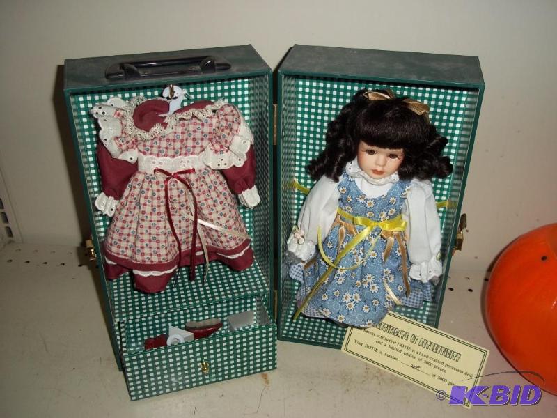 lot 127 image: Porcelain Doll and Dress...