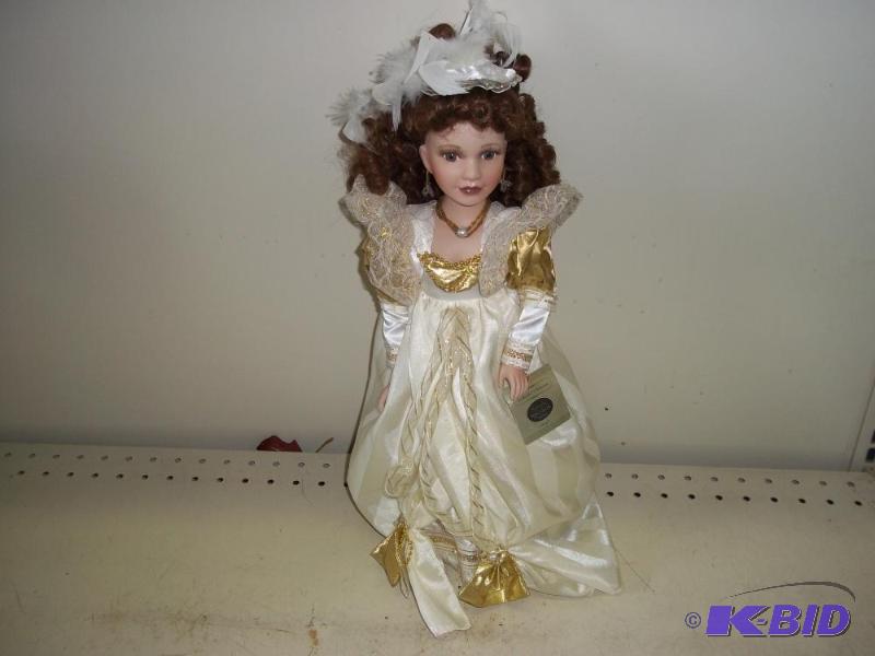 lot 194 image: Porcelain Doll   White and Gold dress ...