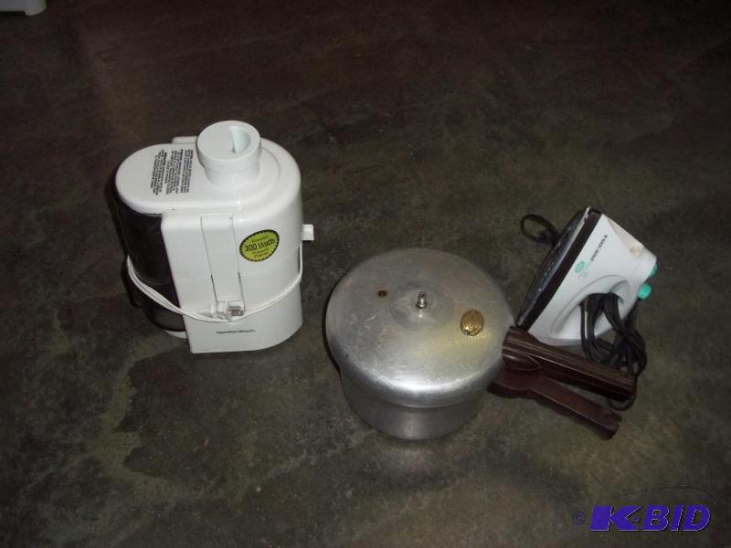 lot 99 image: Juicer, pressure cooker and iron...