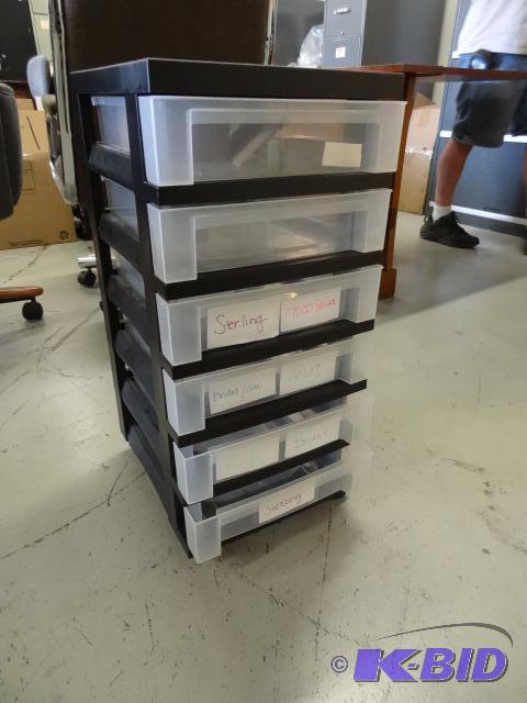 lot 132 image: 6 drawer plastic cabinet on wheels....