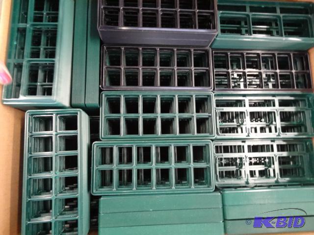 lot 143 image: Green salesman ring trays...