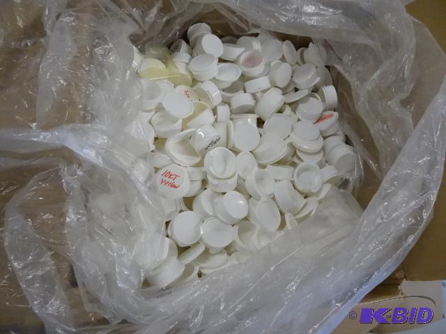 lot 149 image: White ploy cups fot holding jewelry ring mold...