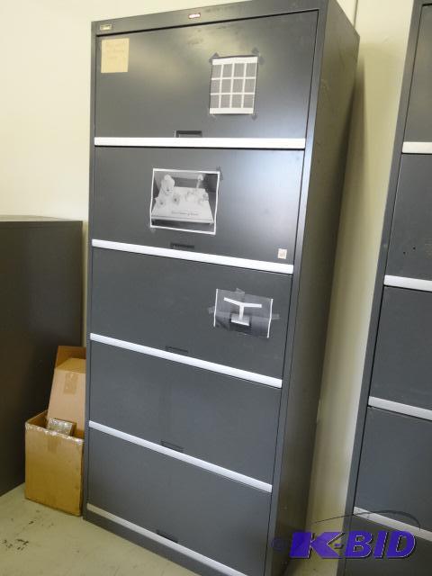 lot 168 image: Tab metal lateral file cabinet. Doors slide i...