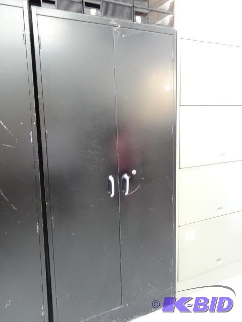 lot 177 image: 2 door metal cabinet. 5 shelves. 36 x 18 x 78...