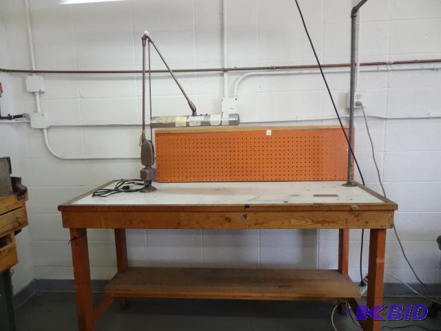 lot 23 image: Jewelers bench with mounted light. 61 x 25 x ...