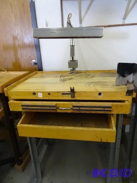 lot 25 image: Wood jewelers work bench. Mounted light. 34 x...