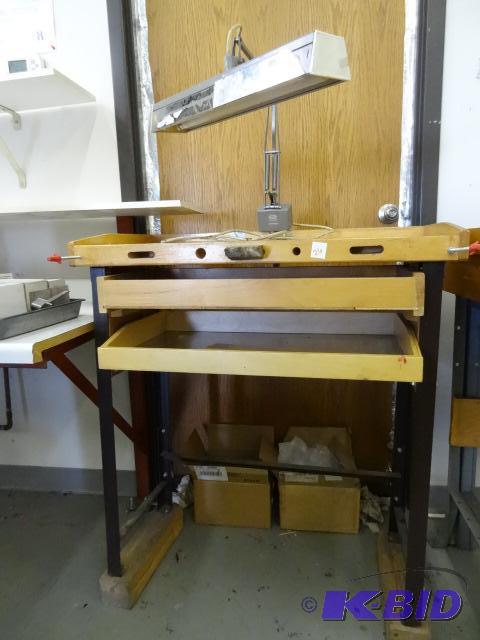 lot 26 image: Wood jewelers bench with metal frame. 32 x 17...