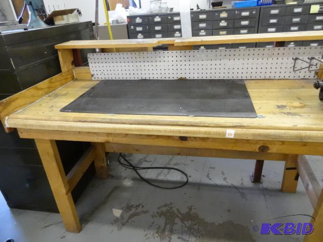 lot 36 image: Wood jewelers bench. 61 x 46 x 22...