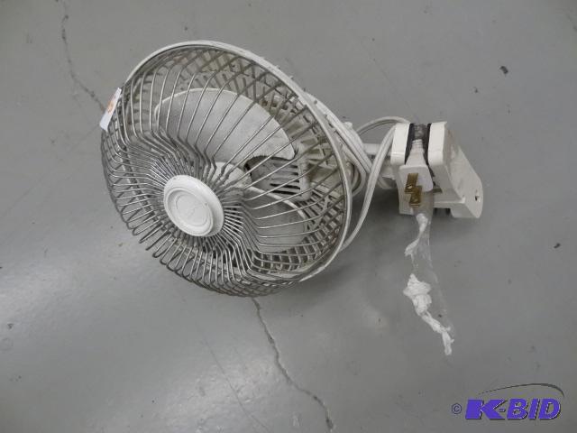 lot 54 image: Lasko clip on fan...