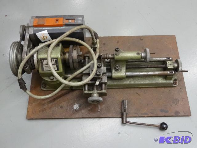lot 65 image: Unimat mini lathe. 110 volt. Electric...