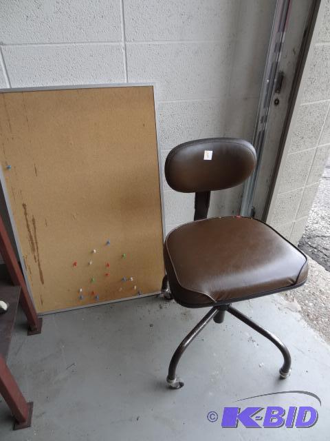 lot 8 image: Office chair on wheels. 36 x 24 cork board...
