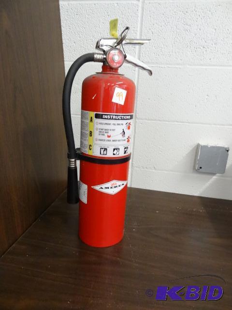 lot 99 image: Fully Charged Fire Extiguisher...
