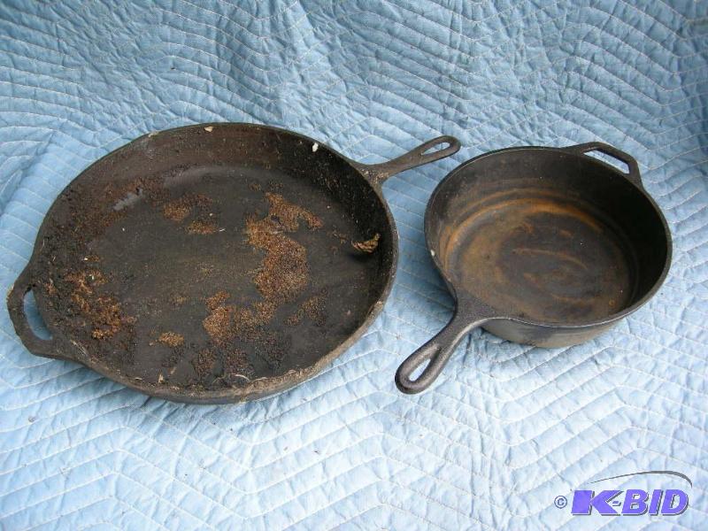 lot 103 image: Lodge 15 14 large cast iron skillet and Lodge double skillet bottom