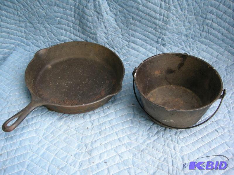 lot 105 image: Unknown cast iron No.10 skillet and a pot