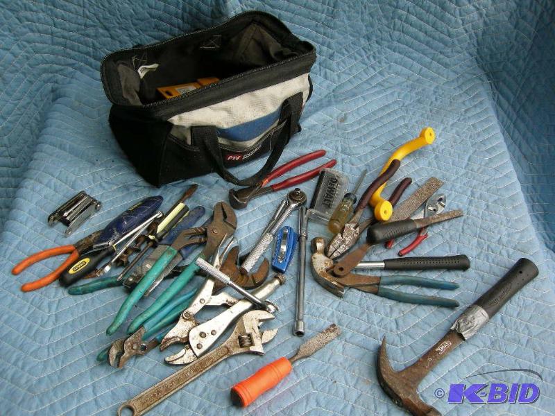 lot 79 image: Canvas tool bag with many tools