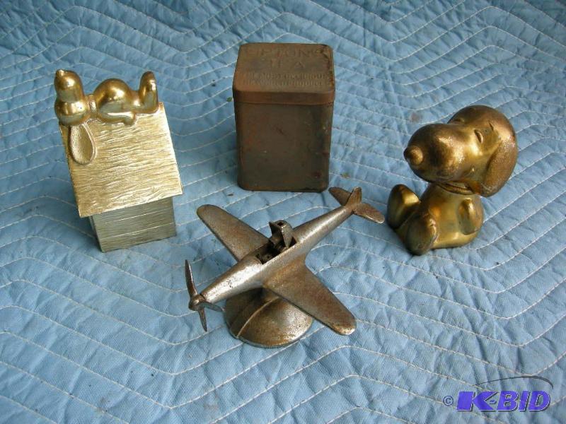 lot 89 image: Vintage Negbaur airplane lighter and more