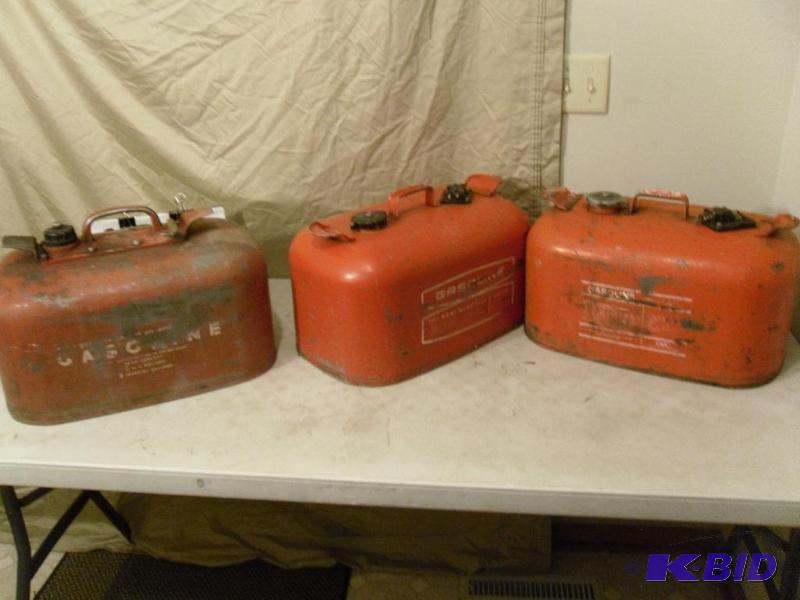 lot 139 image: Lot of 3 Metal Boat Gas Cans. OMC (clean), Un...