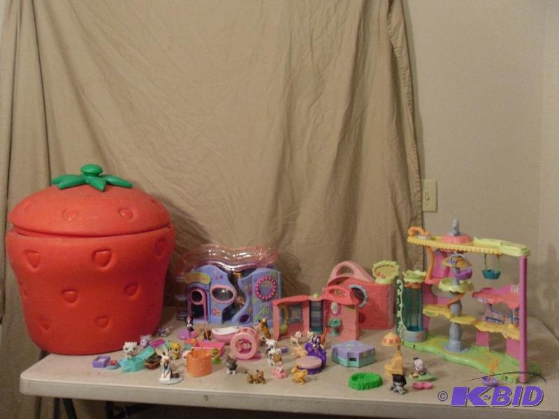 lot 178 image: Strawberry Plastic Toy Box with Lid Full of L...