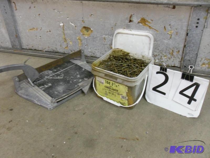 lot 24 image: 12 Inch Quarry Tile Cutter and a New 30 lb Bu...