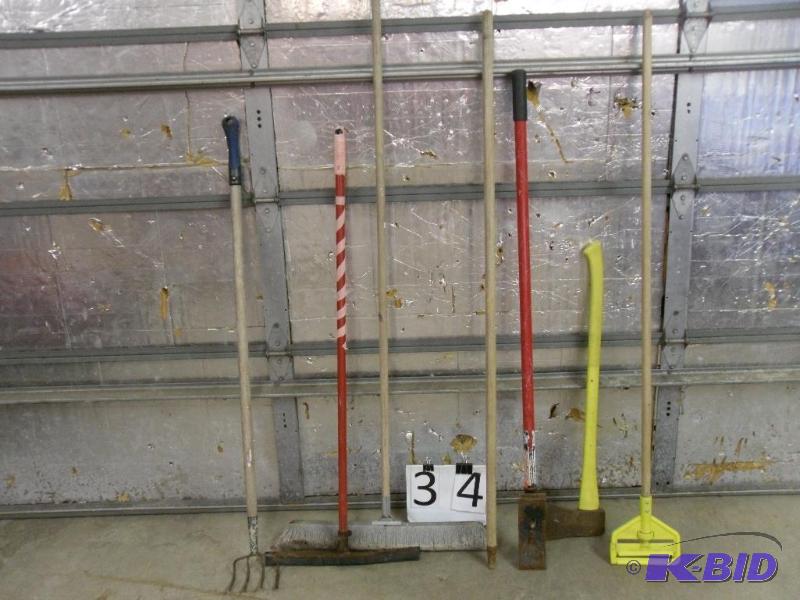 lot 34 image: Lot of Long Handle Tools. Axe, Mop Handle, Ti...