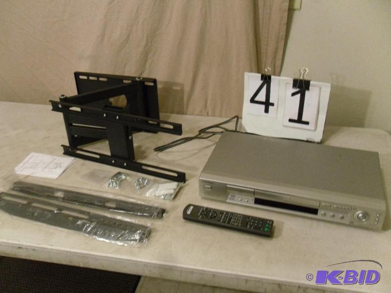 lot 41 image: Sony DVD Player with Remote and a New Flat Sc...