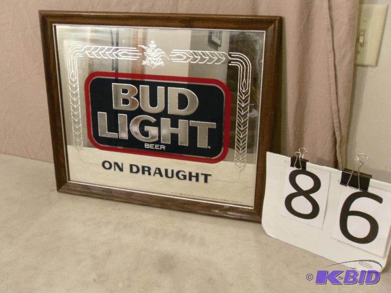 lot 86 image: Framed Beer Bud Light Mirror. Measures 22&quo...