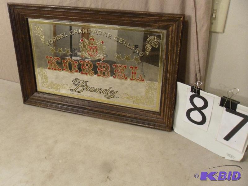lot 87 image: Framed Korbel Brandy Mirror. Measures 25.5&qu...