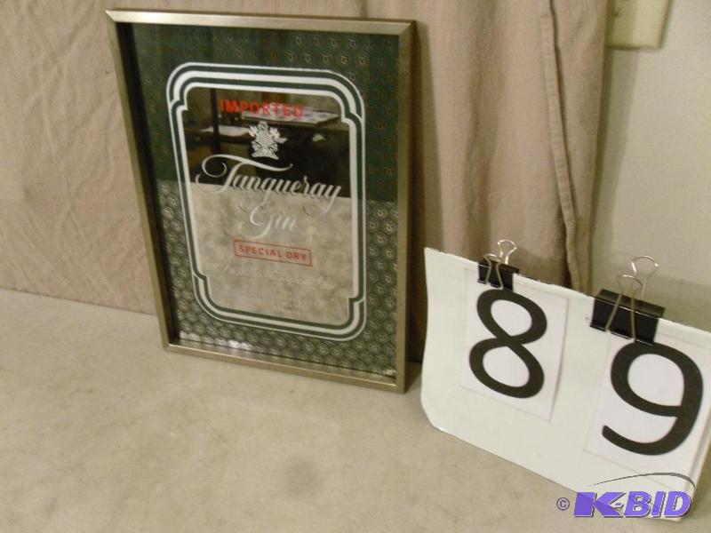 lot 89 image: Tanqueray Gin Framed Mirror. Measures 15.25&q...