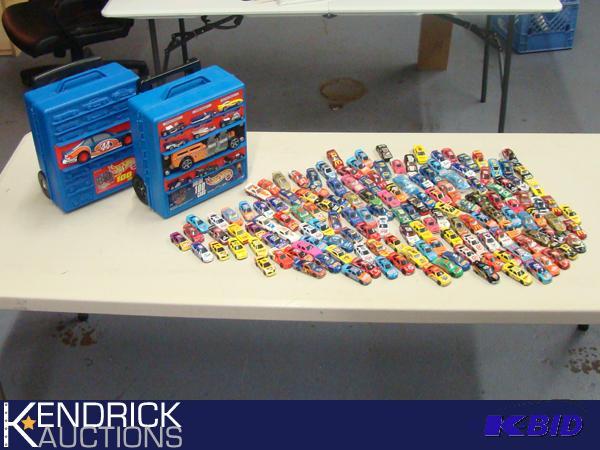 Lot of 125 Loose Die Cast NASCAR Themed 164 Scale Cars, and 2 Hot Wheels Cases