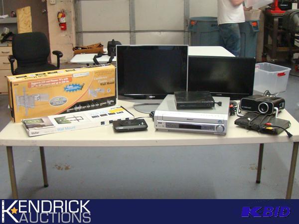 Lot of TVs, Monitors, DVD Players, and TV Wall Mounts