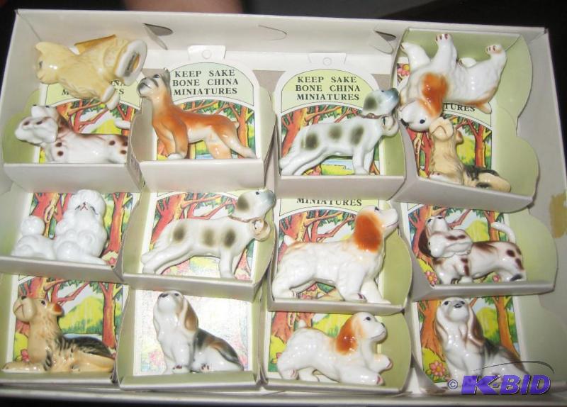 lot 051 image: Set of 14 Bone China Dog Figurines