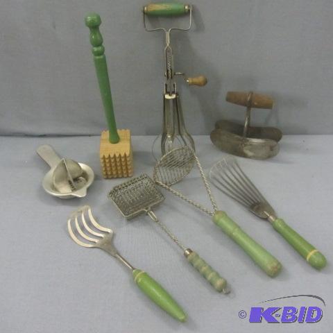 lot 35 image: Green Handled Utensils