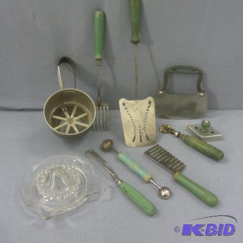 lot 36 image: Green Handled Utensils