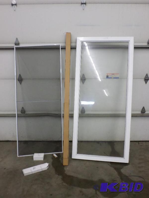 lot 107 image: New 36&quotx80" Storm Door With Hardwar...
