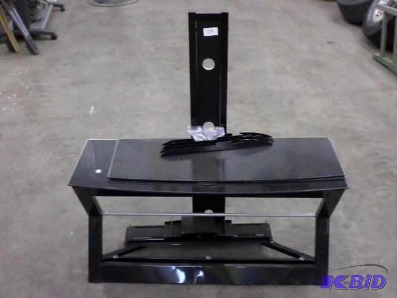 lot 109 image: 3-Level Flat Screen T.V. Stand With Glass She...