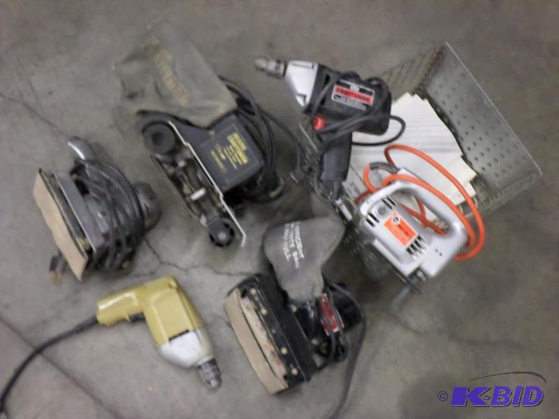 lot 12 image: Basket Of 120Volt Sanders, Drills, Etc...
