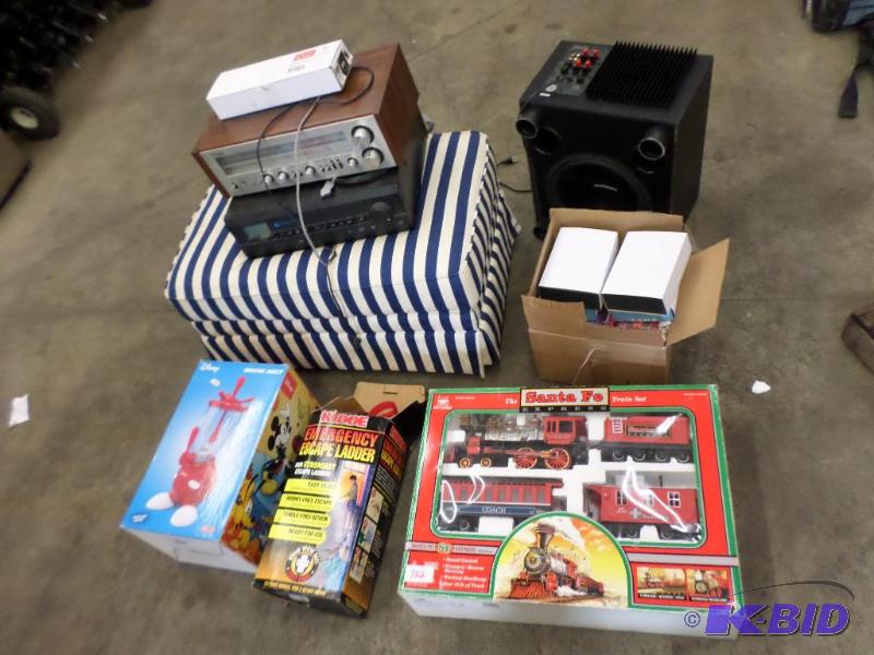 lot 122 image: Lot Of Ottoman, Train Set, Subwoofer, Electr...