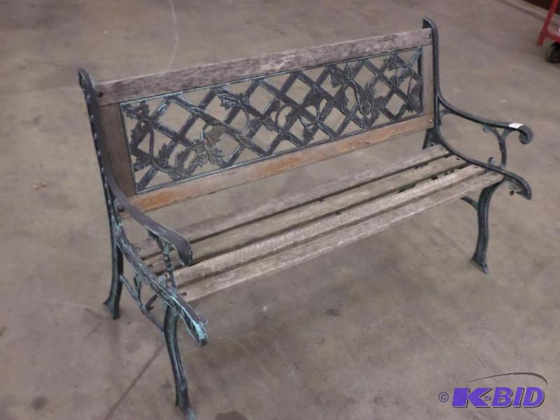 lot 72 image: Cast Iron Framed Wood Bench...