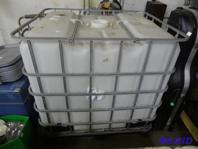 200 gal plastic tote in cage...