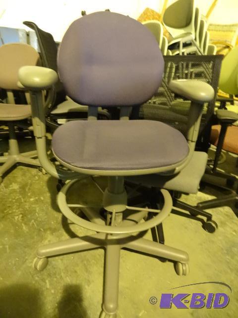 Steel Case adjustable height stool on wheels...