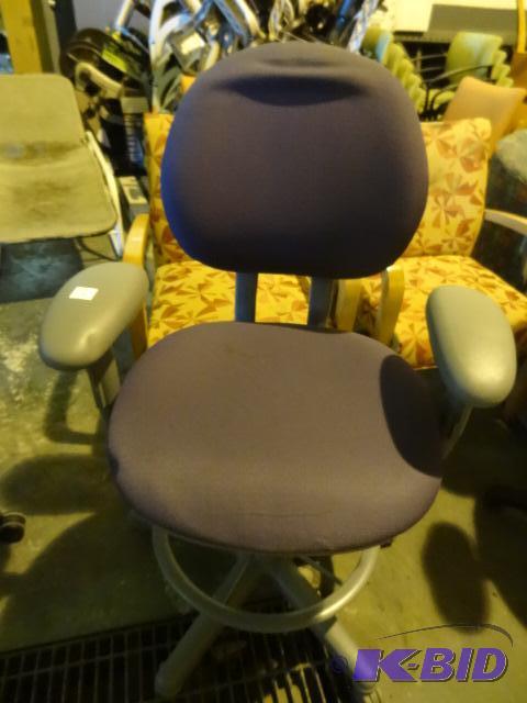 Steel Case adjustable height stool on wheels...